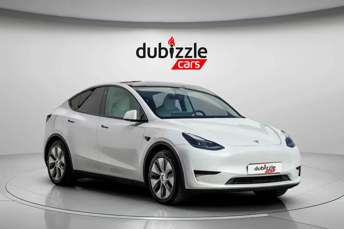 Tesla Model Y 2024 — photo 1 of 15