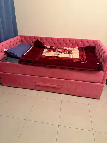 Elegant Pink Daybed with Storage