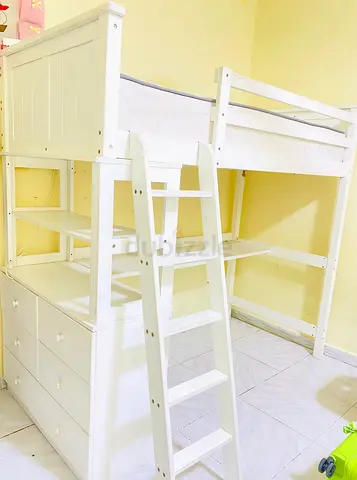 Kids loft bed with desk and storage
