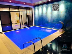 For Sale: Modern Stone Villa with a Luxurious Swimming Pool in Ajman's Most Prestigious Area