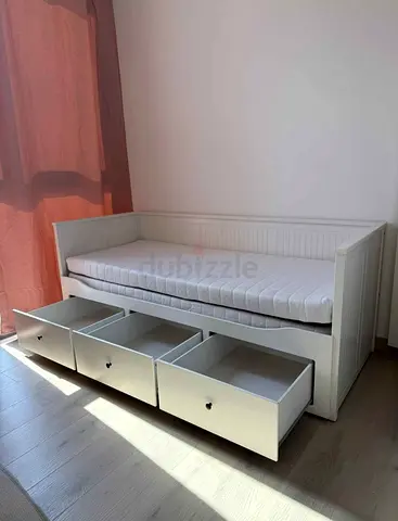 IKEA hamness Day bed with 3 storage drawers underneath and with 2 IKEA mattresses