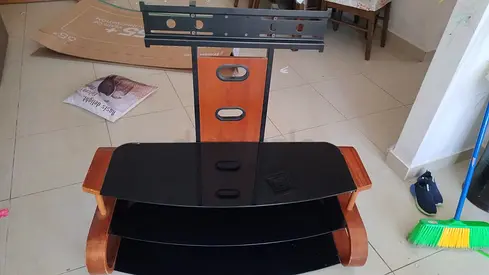 Stylish Black Glass TV Stand with Wooden Accents