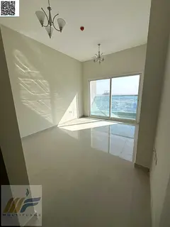 Elegant two bedroom apartment with living room in Gulf Tower Ajman featuring modern design ideal spa