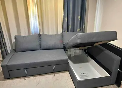 IKEA L shape sofa bed with storage