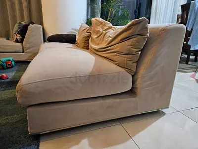 Comfortable Beige Sofa for Sale along with Ottoman at the center