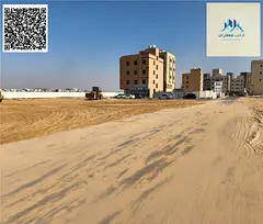 Land for sale – Al Alia area, Ajman. Residential/Commercial – Directly on the main road.** Permi