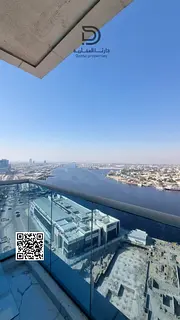 Own a studio in Al Waha Towers, Ajman, in a prime strategic location close to all services and key f