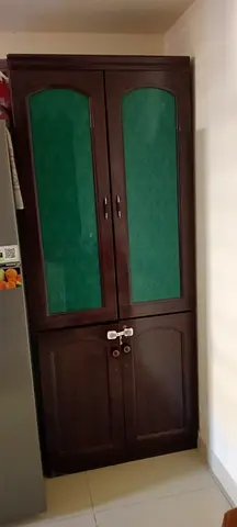 Elegant Wooden Cupboard with Glass Panels