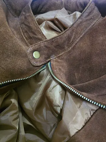 New suede jacket with manufacturing defects shown in the picturesجاكت شمواه جديد به ديفوهات تصنيع