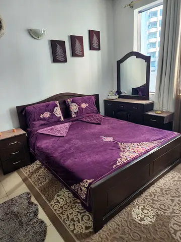 Elegant Purple Bed Set with Matching Nightstands