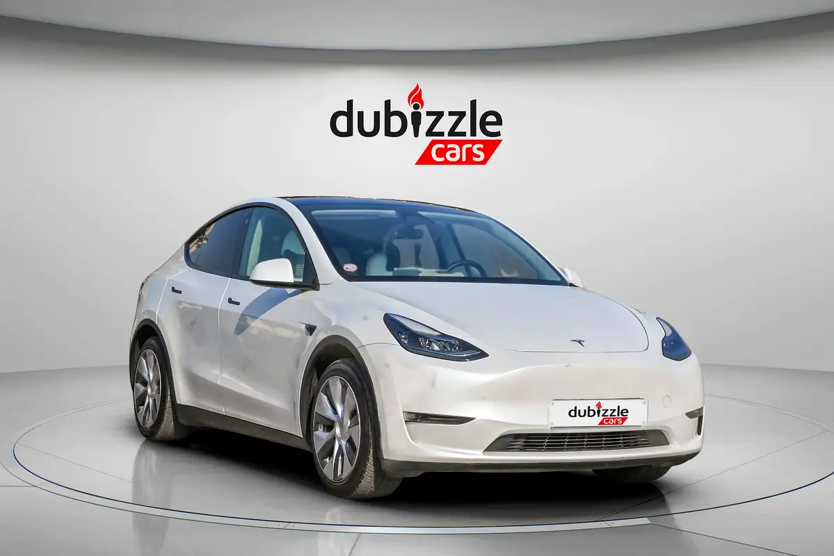 Tesla Model Y 2024 — photo 1 of 17