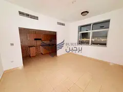 Elegant Studio in a Quiet Building with separate kitchen with central ac just under 20000 AED