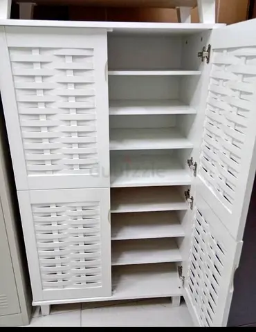 Charming White Storage Cabinet with Lattice Design