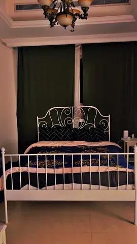 Charming White Metal Bed Frame with Bedding