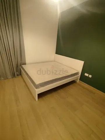 IKEA Malam king size bed frame with IKEA mattress 180×200cm is available in excellent condition,