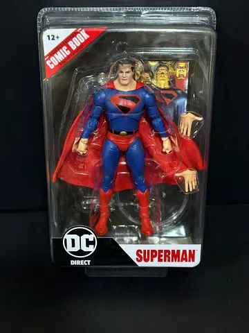 McFarlane Superman with comic book