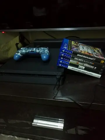Ps4 Slim ( 1tb with games and controller )