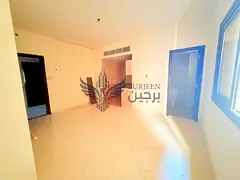 Bright Studio for Immediate Move-In with separate kitchen, central ac under 18000 AED