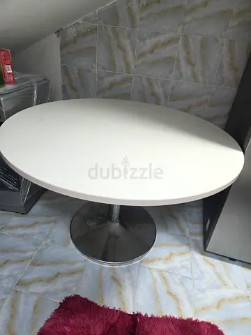 Sleek Oval Dining Table for Sale