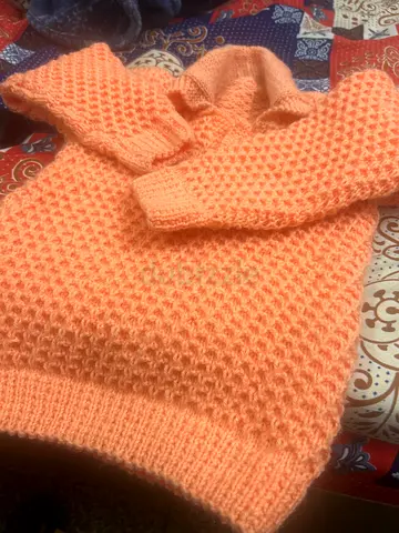 Adorable Handmade Baby Sweater in Soft Coral