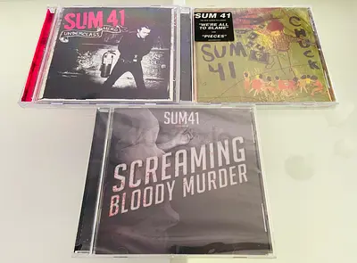 3 Sum41 Music CD’s