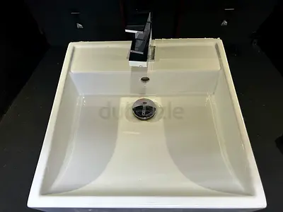 Modern White Bathroom Sink with Stylish Faucet