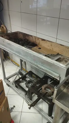 Barbaque stand with electric blower and two gas stoves