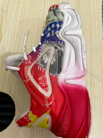 Stylish Red and White Sneakers with Unique Design