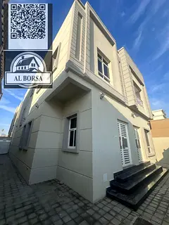 For rent in Al Zahia: a villa with 5 master bedrooms, a majlis (formal sitting room), a living room,