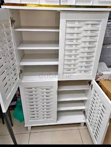 Elegant White Cabinet with Louvered Doors