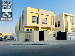 For sale in Al Yasmin, a corner villa with 5 master bedrooms, a majlis, a living room, a kitchen, an