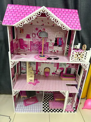 Charming Pink Dollhouse for Creative Play