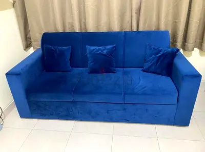 Comfortable Blue Sofa with Cushions