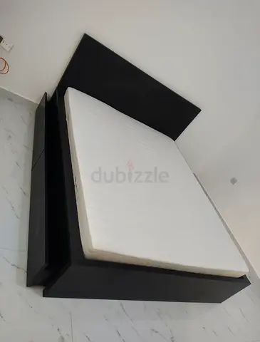 IKEA king‑size bed (180 × 200 cm) with 2 storage drawers underneath and an IKEA mattress