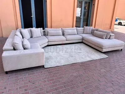 Comfortable L-Shaped Sofa With Pillows for Sale