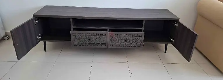 Stunning Wooden Entertainment Center with Carved Details