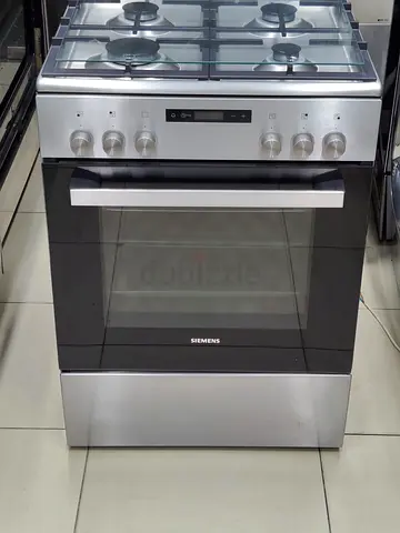 Siemens top four burner gas electric oven size 60cm