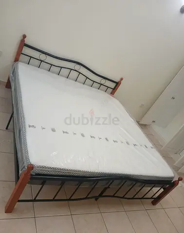 Brand new King size wooden steel bed frame With Mattress Available