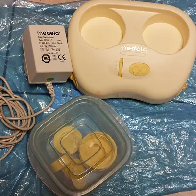 Medela Mini Electric Plus Pump Base and Charger