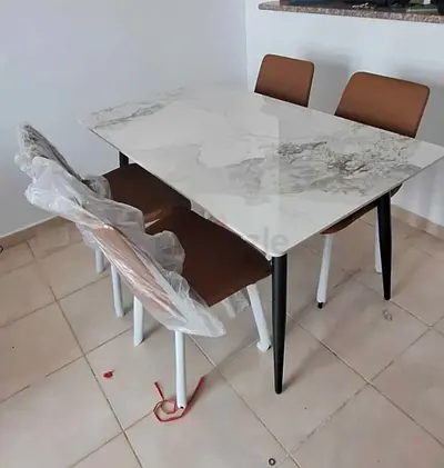 Brand new Dinning Table with 4 chairs available