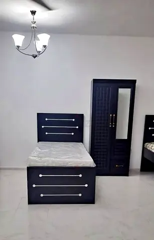 Brand new Single size bed frame With two door Cabinet Available