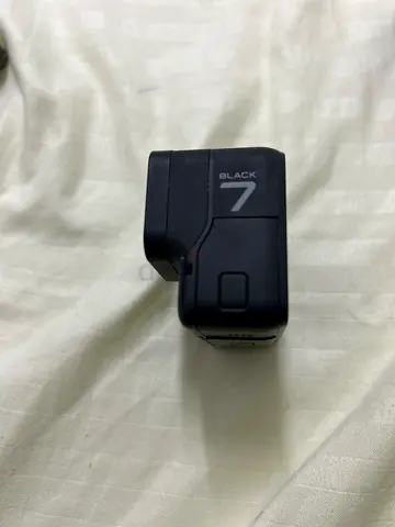 GoPro Hero 7 Black Action Camera - Compact and Versatile with extra 2 batteries and some accessories