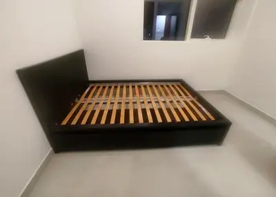 IKEA queen‑size bed (160 × 200 cm) with 2 storage drawers underneath and an IKEA mattress