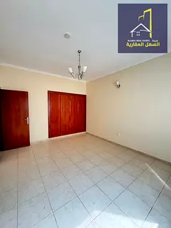 Two-bedroom apartment with a living room, air conditioning, and free parking.