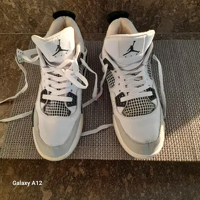 Authentic Air Jordan 4 Sneakers in Excellent Condition