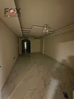 “Premium 2BR apartment in Al Mowaihat, first tenant, with central AC, flexible payments, spacious 