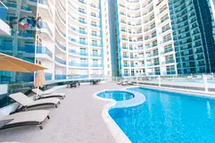 A refined two-bedroom apartment in Al Waha Towers with modern design, freehold for all nationalities