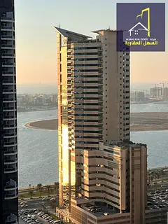 Two-bedroom apartment, living room, and parking space in a strategic location
