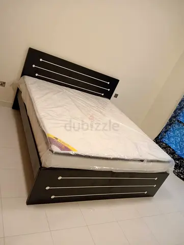 Brand new King size wood bed frame With Mattress Available