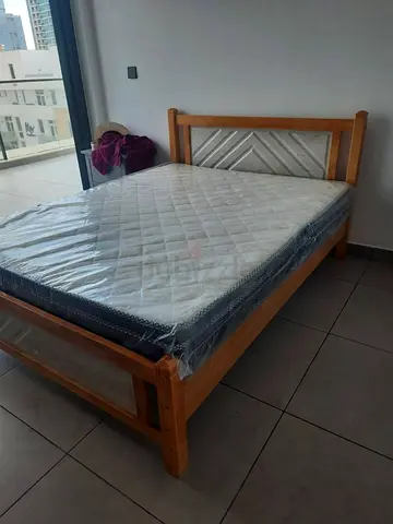 Brand new Solid wood King size bed frame With Mattress Available